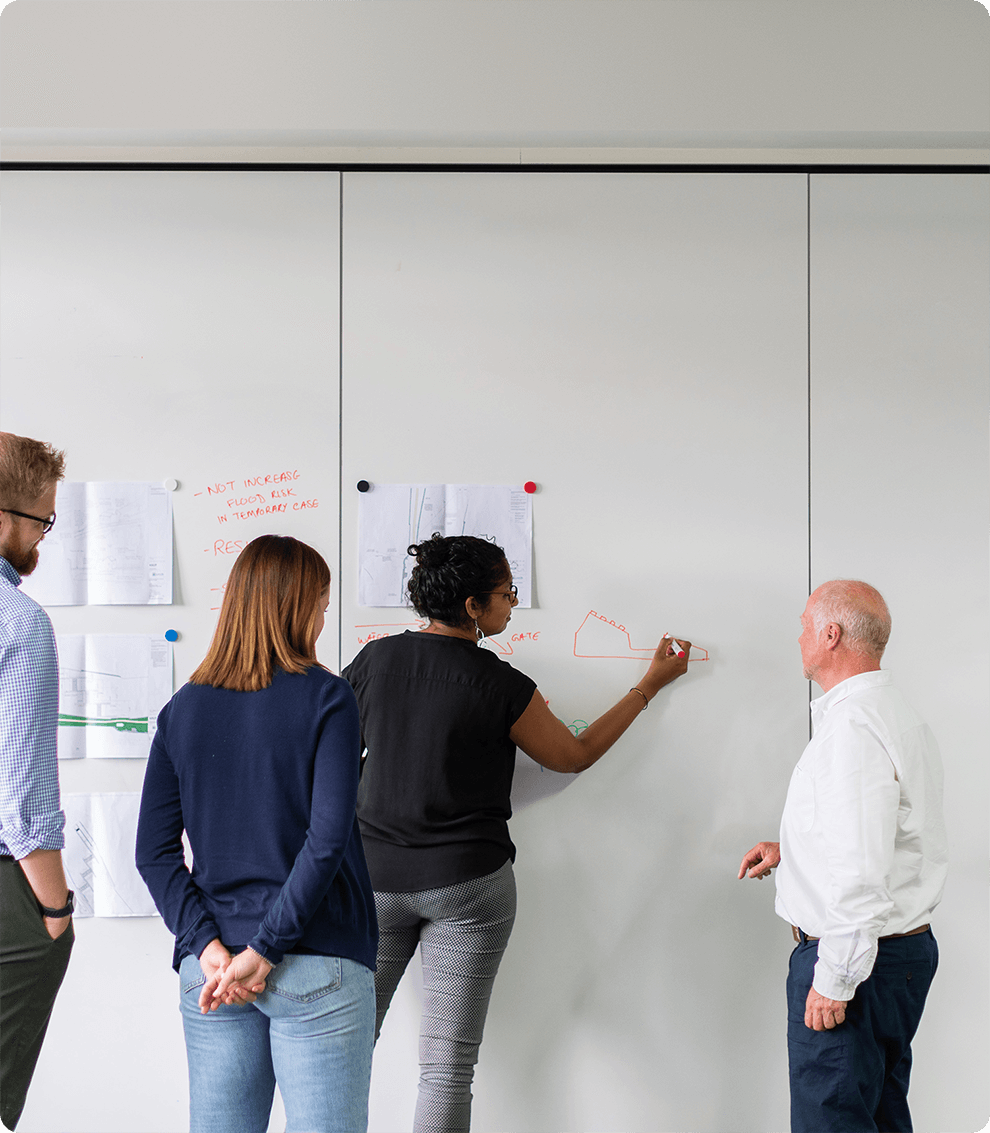 Consultants on whiteboard