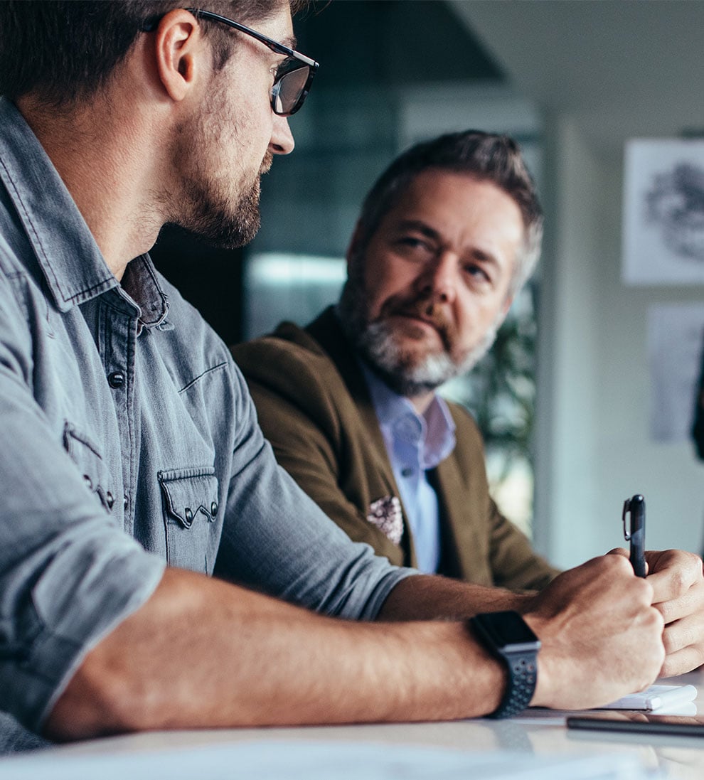 Men Discussing Sponsor Delegation Terms